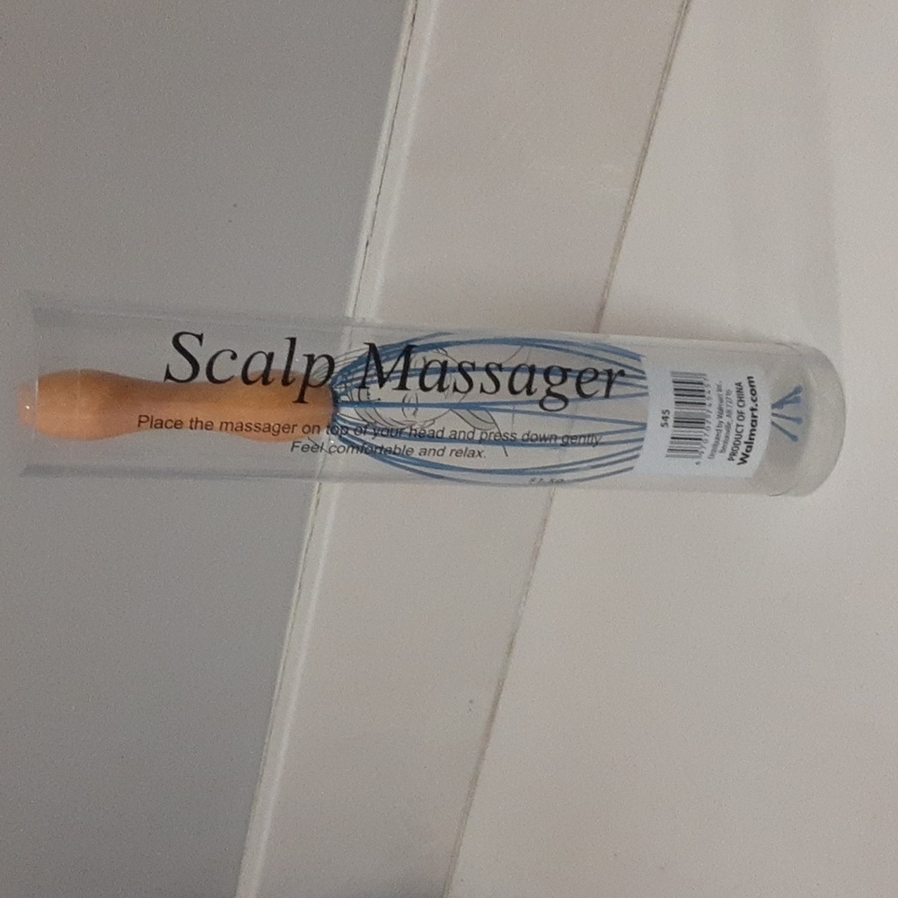 Free with purchase. Scalp massager.